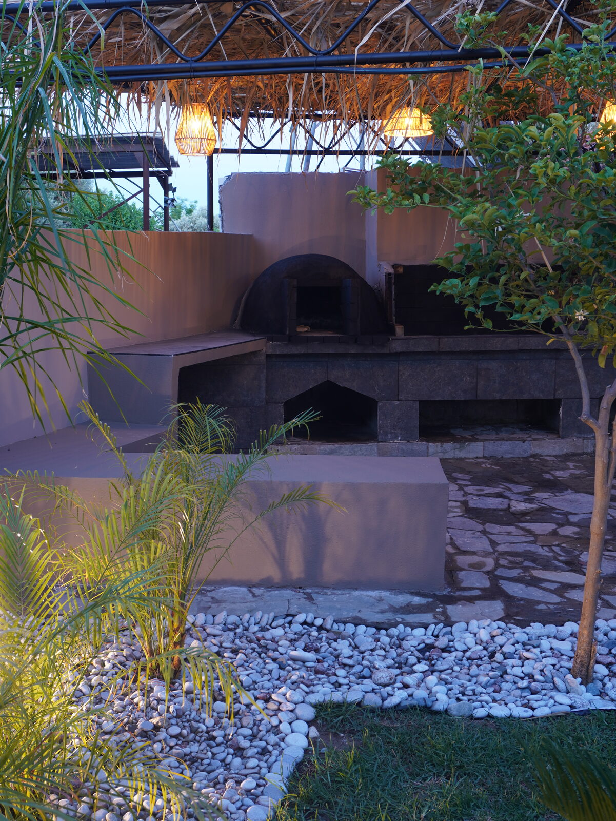Stone BBQ oven in the private yard of Casa Avgeri